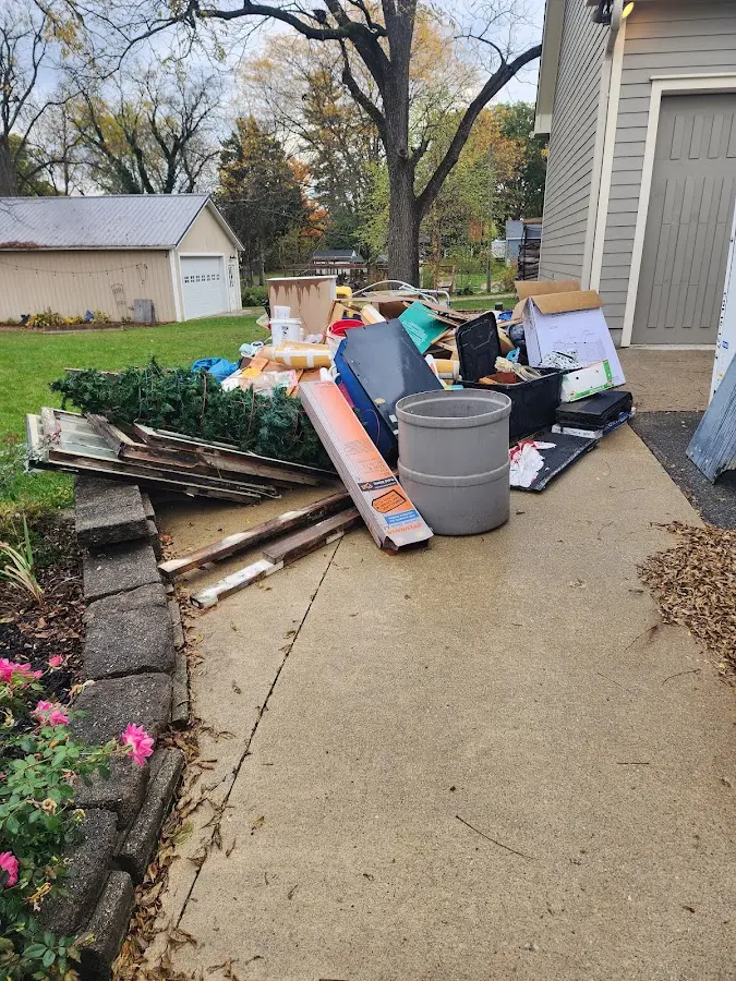 Dumpster being loaded with debris for Residential Dumpster Rental in Mokena